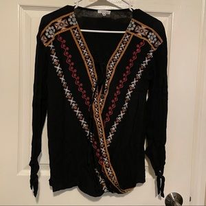 Fun wrap style blouse. Like new, excellent condition. Small.